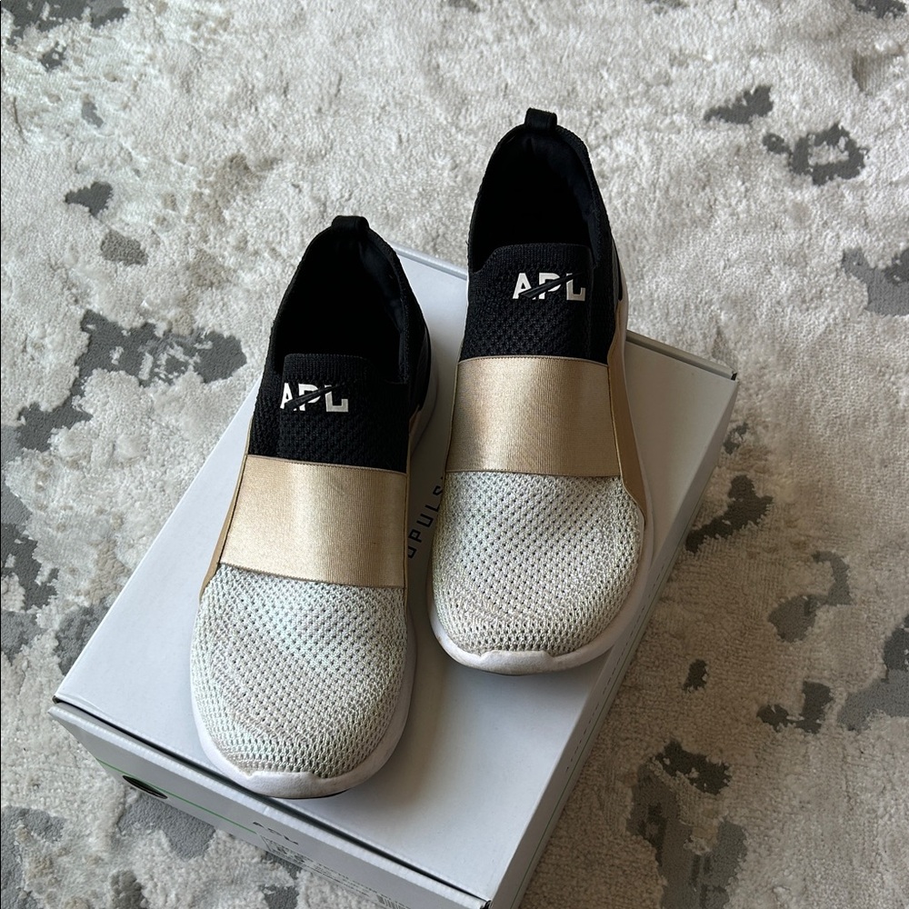 APL Metallic Gold and Black Slip-On Shoes!